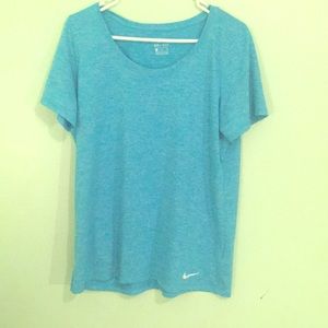 Athletic Nike DRI-FIT shirt.